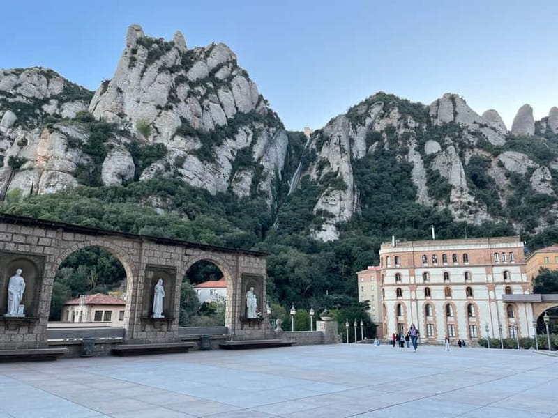 Barcelona: Montserrat afternoon tour, easy hike & boys choir - Arriving at Montserrat During the Evening Glow