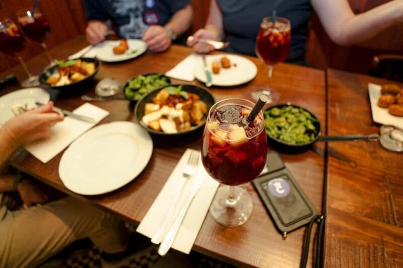 Barcelona: Old City Hidden Gems, Tapas, & Drinks Guided Tour - Enjoying Drinks and the Porrón Wine Challenge