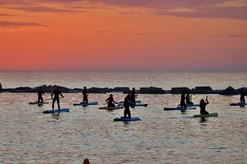 Barcelona: Paddleboarding at Sunrise Includes: teacher, photos, and materials - Experience the Magic of Sunrise Paddleboarding in Barcelona