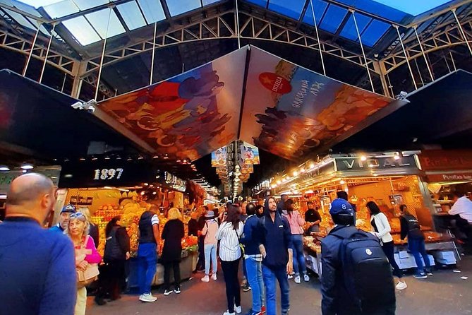 Barcelona : Paella Cooking Experience + Boqueria Market Exclusive Tour - Exploring the Mercat de la Boqueria: Barcelona’s Historic Food Market