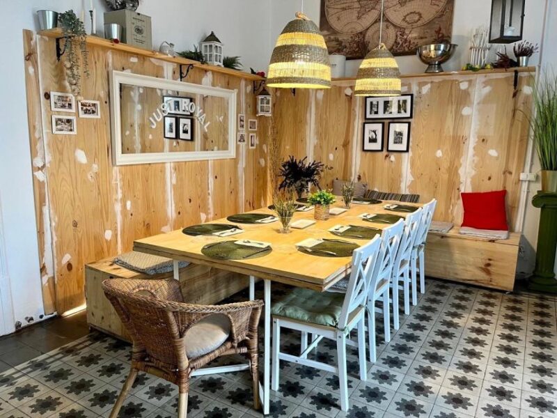 Barcelona: Paella Cooking Workshop and Market Tour - Enjoying Unlimited Drinks in a Historic Setting