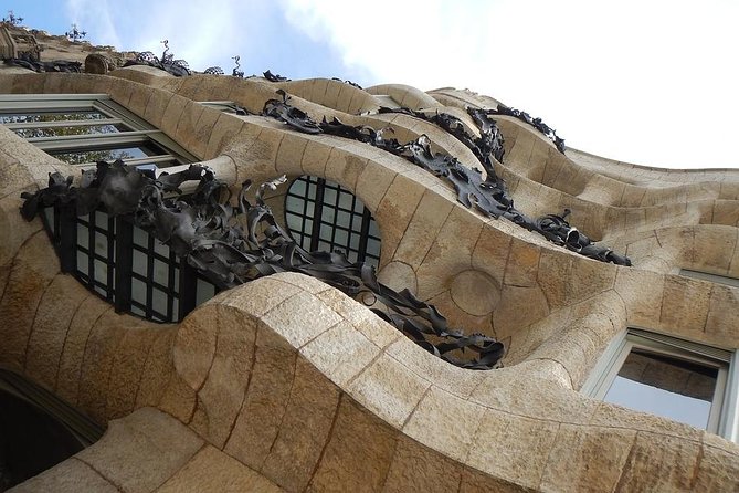 Barcelona Private Walking Tour with Skip the Line La Pedrera and Casa Batllo - Walking Along La Rambla: The City’s Most Famous Street
