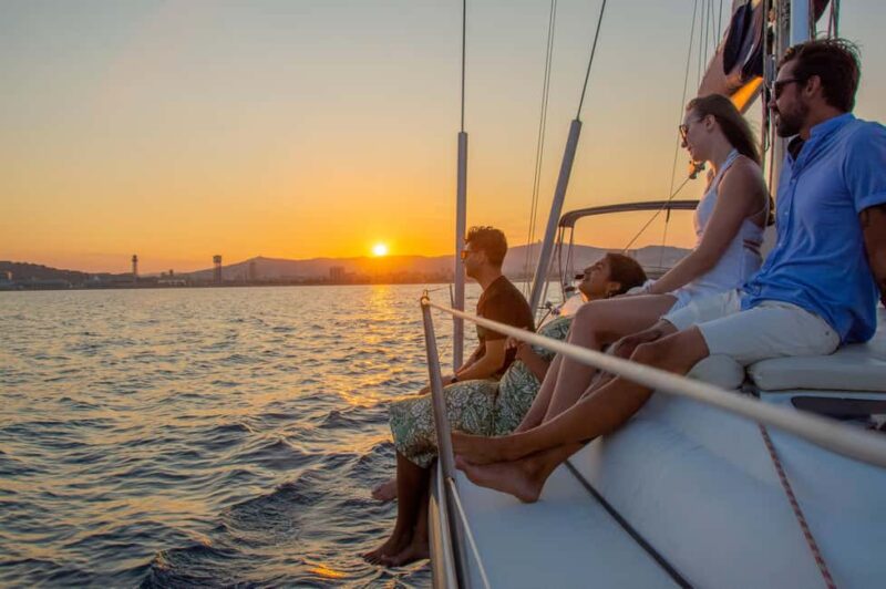 Barcelona: Sailing boat ride with sunset, wine and snacks - Indulge in Wine and Snacks on the Water