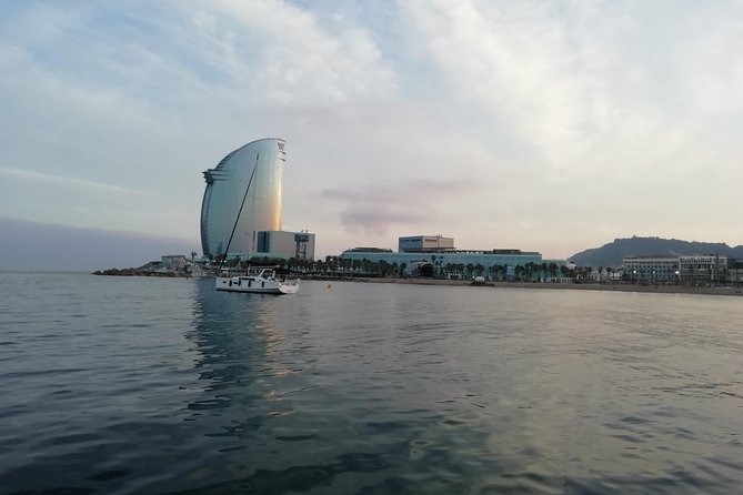 Barcelona Sailing Sunset Experience from Port Olimpic - Snacks, Drinks, and the Mood Onboard