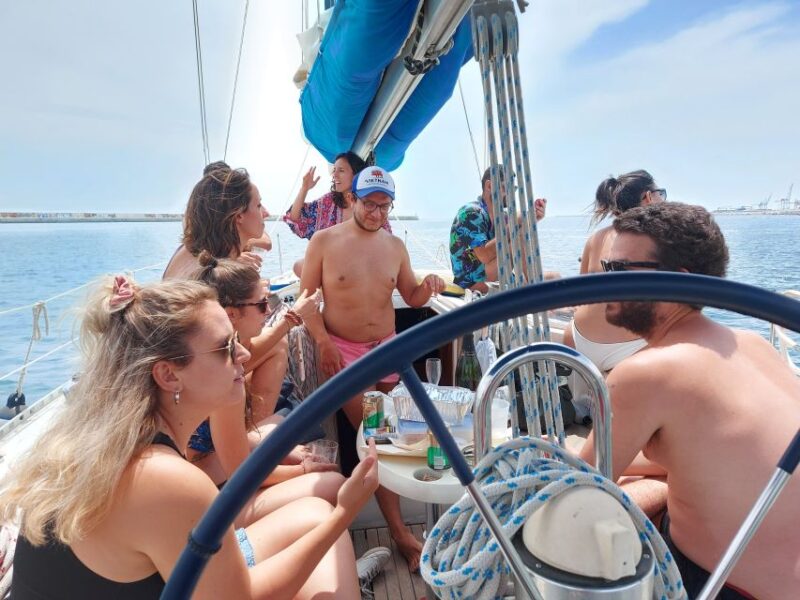 Barcelona Sailing Tour Drinks, snacks Swim & Stunning Views - Key Points