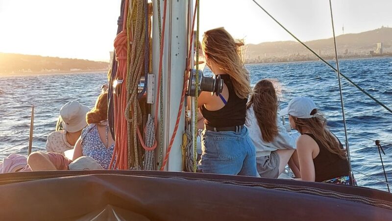 Barcelona Sailing Tour Drinks, snacks Swim & Stunning Views - Enjoying Drinks and Tasty Snacks Onboard