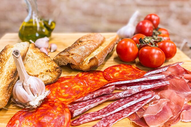 Barcelona Seafood Paella Class & Sangria with a Top Chef - Expert Guidance and Engaging Cooking Demonstrations