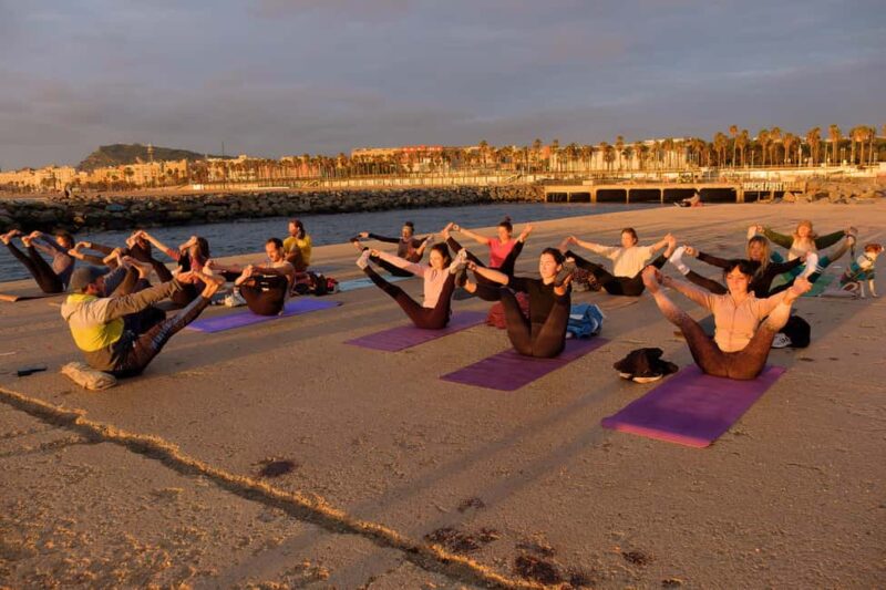 Barcelona: Sunrise Yoga by the Sea & Morning Dip - Chat, Coffee, and Croissants in the Park