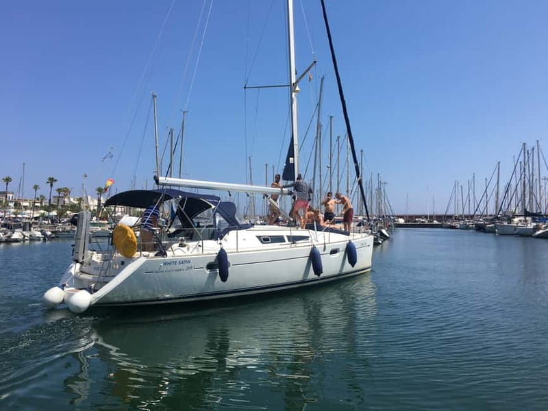 Barcelona: Sunset Boat Trip with Cava Wine and Snacks - Learning to Steer the Boat and Socializing with the Skipper