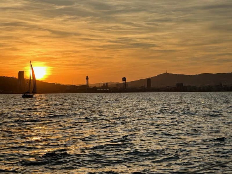 Barcelona: Sunset Sailboat Cruise with Open Bar and Snacks - Suitable Audience and Considerations