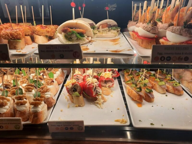 Barcelona: Tapas and Pintxos Tour with Crema Catalana - Visiting a Range of Local Food Spots and Venues