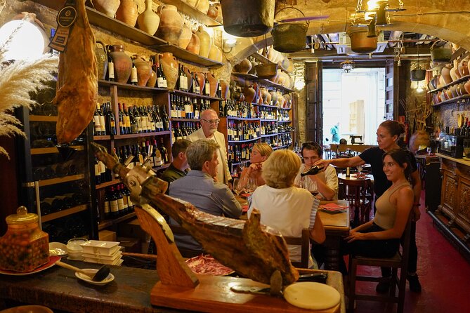 Barcelona Tapas and Wine Experience Small-Group Walking Tour - Authentic Food and Wine in Historic Settings