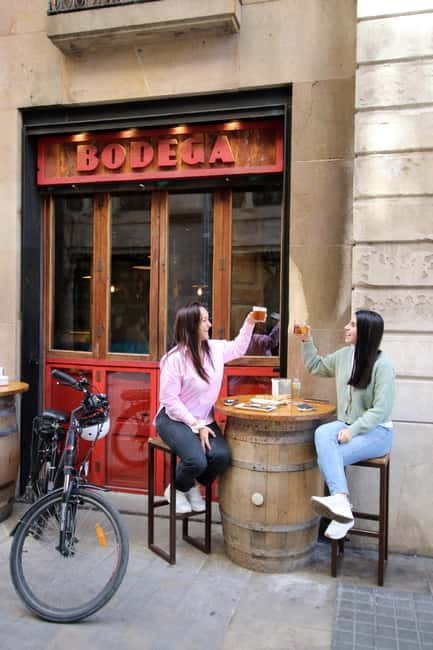 Barcelona: Tapas Tasting Tour by Regular Bike or E-Bike - Sampling Cured Meats at Xarcuteria Ferran