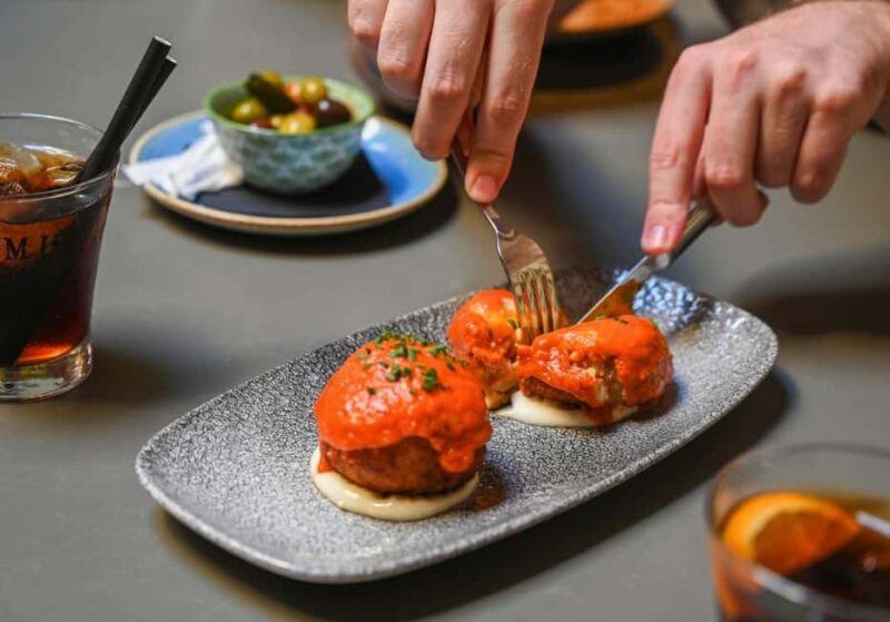 Barcelona: Tapas Tour with Wine and Local Foodie Guide - Key Points