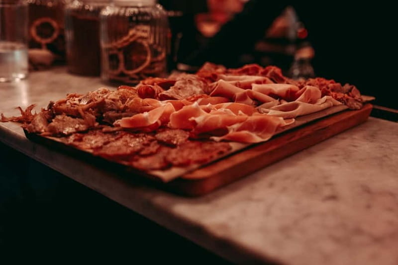 Barcelona: Tipsy Tapas & History Tour in the Gothic Quarter - The Final Venue with Live Music and Gourmet Flavors