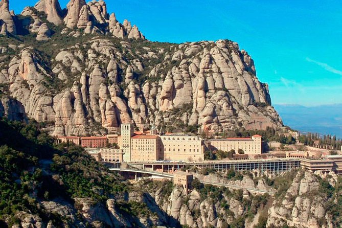Barcelona to Montserrat: Guided Tour & Return Bus Transfers - Transport and Group Size