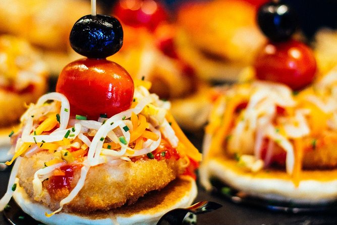 Barcelona With Locals: Wine and Tapas Private Tour - Exploring Carrer de Blai, Barcelona’s Tapas Street