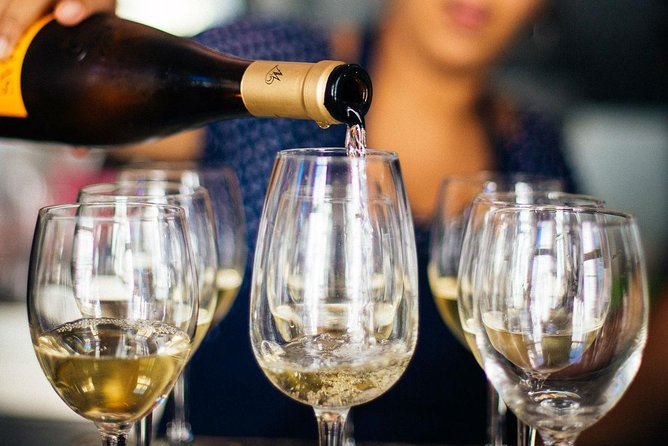 Barcelona With Locals: Wine and Tapas Private Tour - Locations and Stops in the Barcelona Neighborhoods