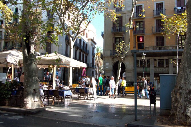 Barcelona's El Raval and the Gothic Quarter: A Self-Guided Audio Tour - Visiting the Food Market and Local Landmarks