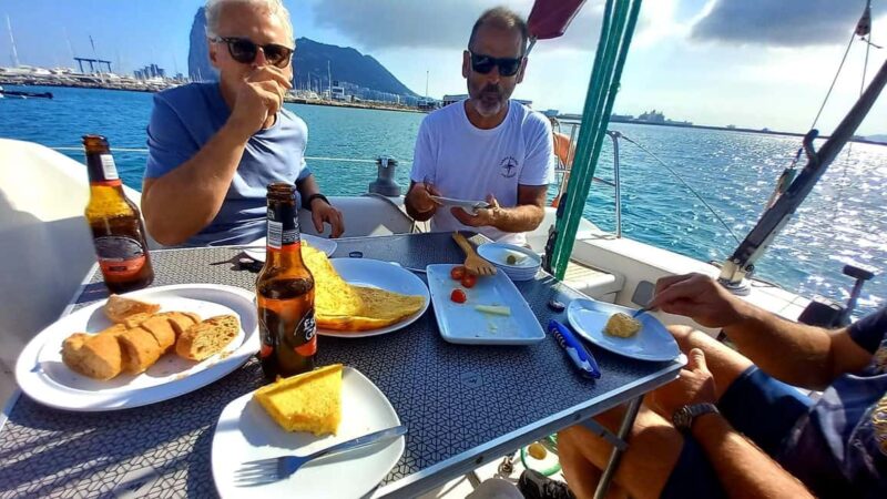 Bay of Gibraltar sail tour with huge ships, dolphin spotting, tapas & drinks - Sailing Experience and the Opportunity to Steer the Boat