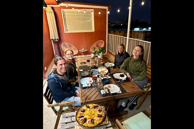 BBQ Paella in a Penthouse Terrace in Barcelona with a Chef - Cooking Paella over Charcoal: A Traditional Technique