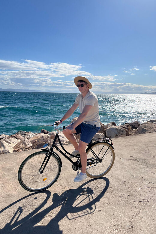 Beachside Cycling Adventure: Athens Tour with Swimming Stop - Return to the Starting Point and Tour Closure