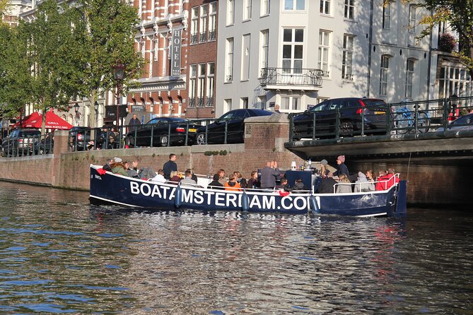 Beautiful (Open Boat) Canal Cruise in Amsterdam Open Bar included - Iconic Landmarks and Unique Stops