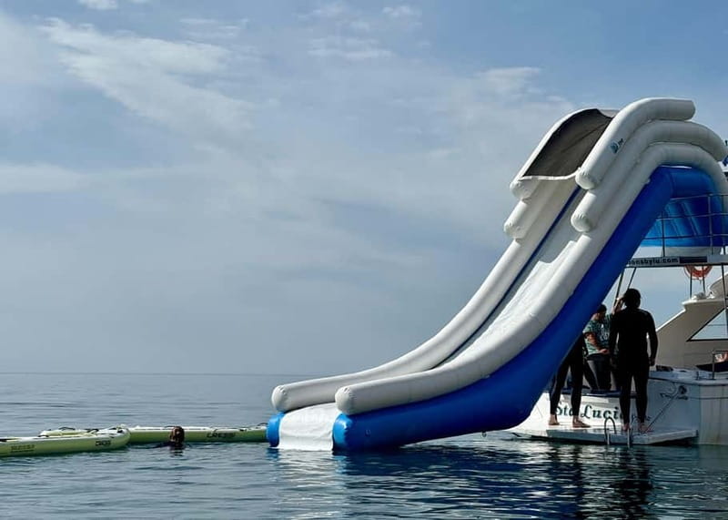 Benalmádena Boat Tour with Snorkeling, Water Slide and Lunch - Practicalities: What to Bring and Important Restrictions