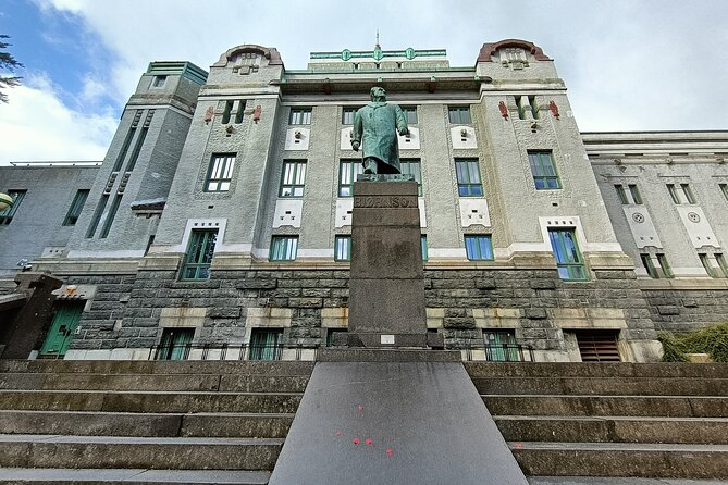 Bergen's Landmarks and History: A Self-Guided Audio Tour - Exploring Festplassen Plaza and Its Statues