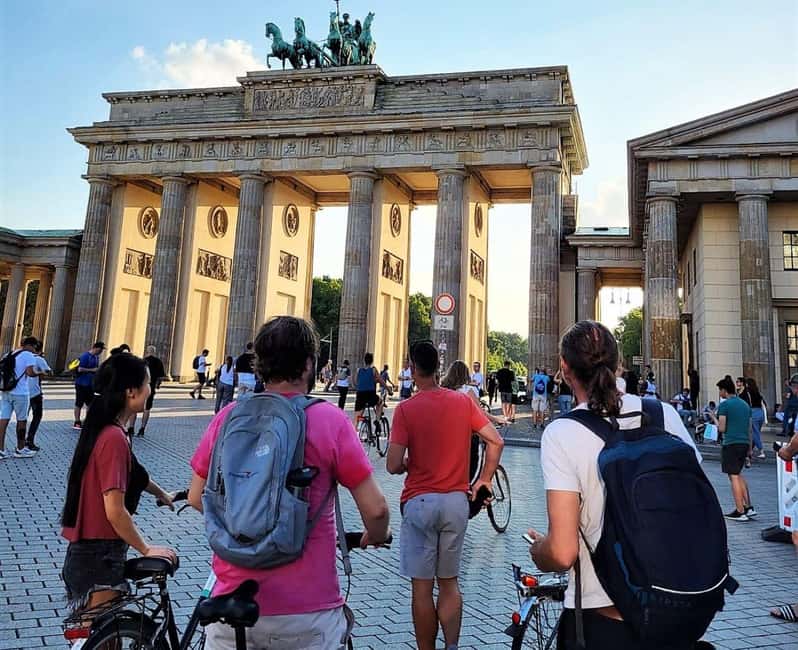 Berlin: From East to West & Wall Tour by Bike with a Guide - Visiting the East Side Gallery and the Berlin Wall