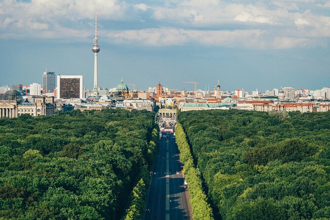 Berlins Must-See History Sites Private Black Van Half-Day Tour - Visiting the Reichstag Building and Brandenburg Gate