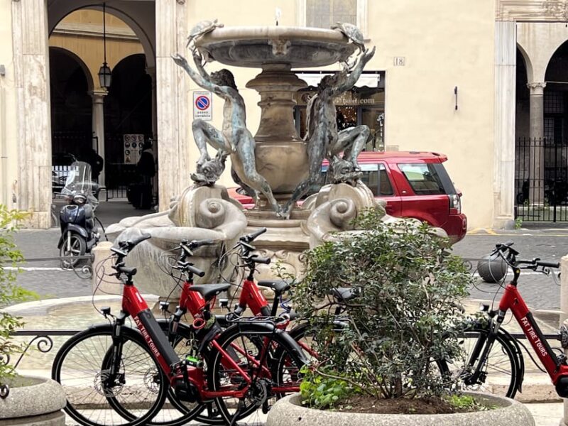 Best of Rome Electric Bike Tour - Passing Through Piazza Venezia and the Imperial Forums