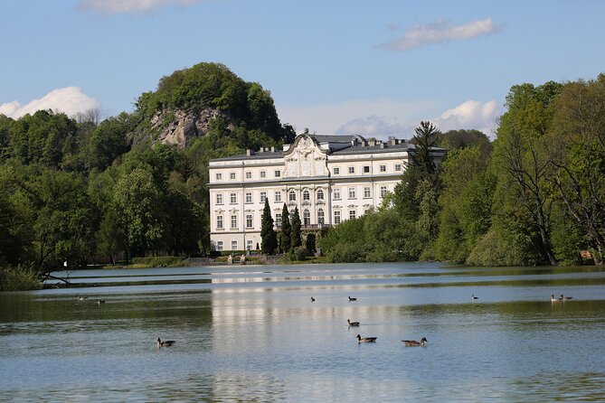 Best of Salzburg 1-Hour Private Sightseeing Tour - Visiting Schloss Leopoldskron: The Iconic Lakefront Palace
