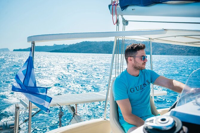 Best of Santorini Private Half-Day Catamaran Cruise with transfer and meal - Visiting Fira and Its Cliffside Charm
