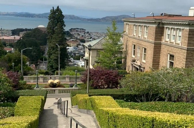 Billionaire Row and Palace of Fine Art Walking Tour - Walking Along Crissy Field at Sunset