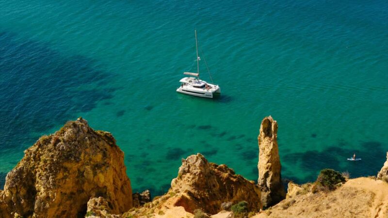 Blue Breeze Full Day Private Catamaran in Lagos, Algarve - Discover Lagos’ Coastal Beauty on a Private Catamaran