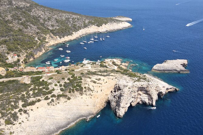 Blue Cave and Town Hvar with 5 Island Boat Tour - Visiting Komiza on Vis Island