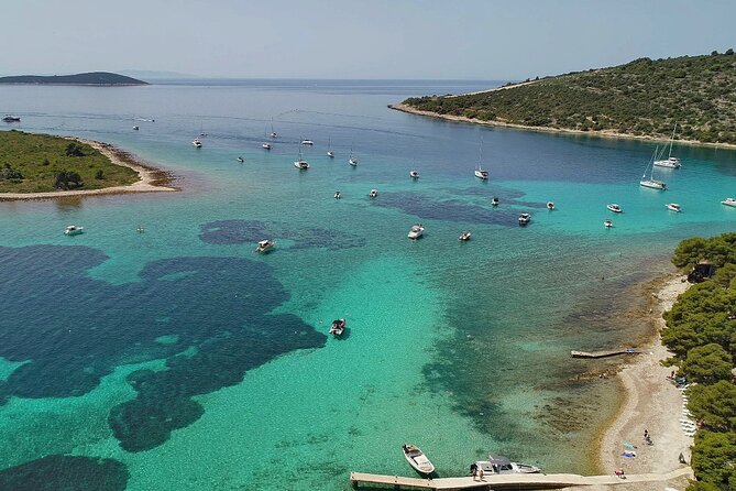 Blue Lagoon and 3 Islands Speedboat Tour from Trogir - Exploring the Blue Lagoon / Krknjasi Bay