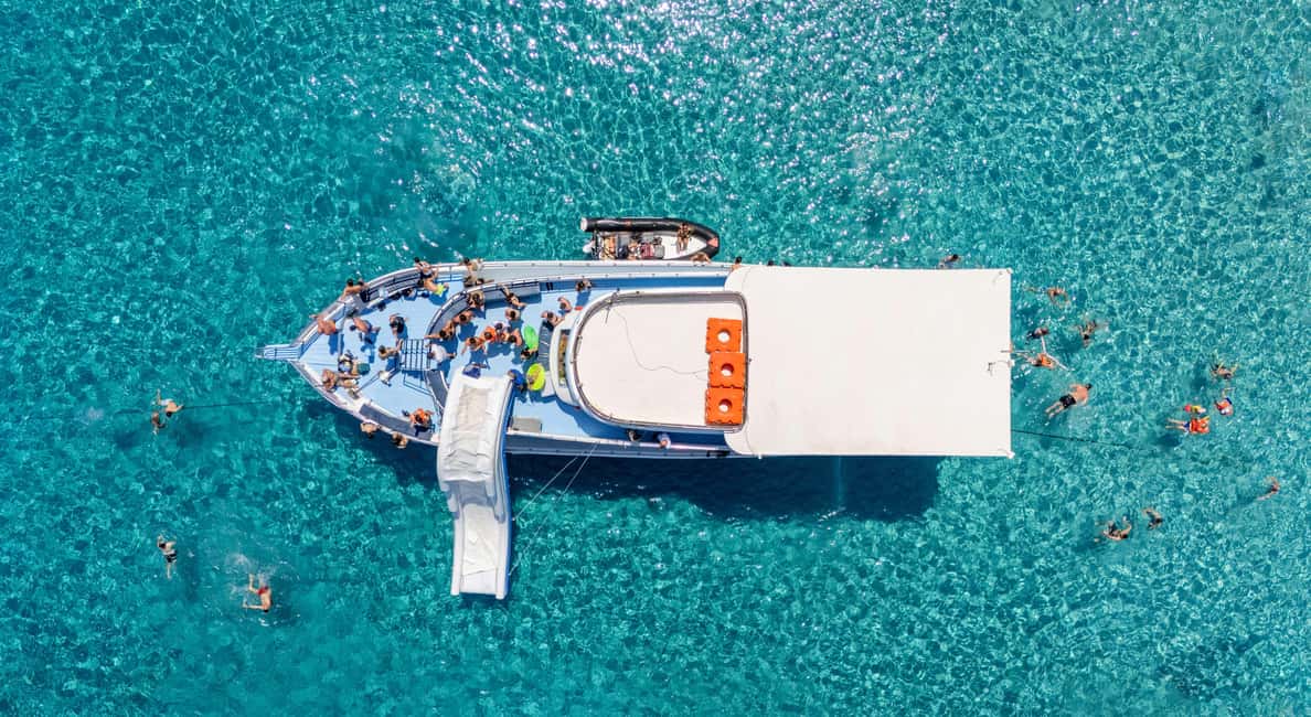 Blue Lagoon Cruise: Waterslide Adventure from Latchi Harbour - The Blue Lagoon Stop: Swimming, Waterslide, and Refreshments