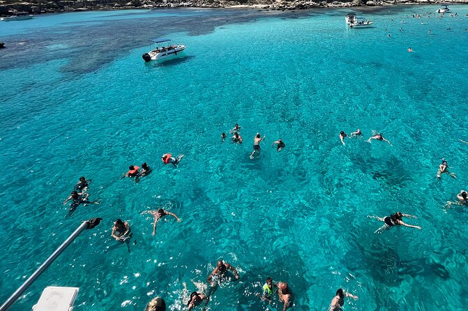 Blue Lagoon trip with slide, music & transfer from Paphos - The Boat Cruise and Entertainment