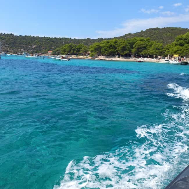 Blue lagoon with a speed boat water and towels included - The 40-Minute Speedboat Ride Back to Split