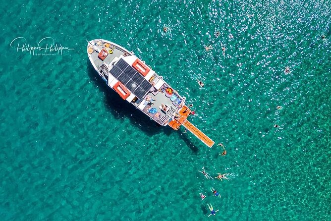 Boat Cruise in Lindos with Swim Stops & Meal Deal - The Guide and Guest Experience
