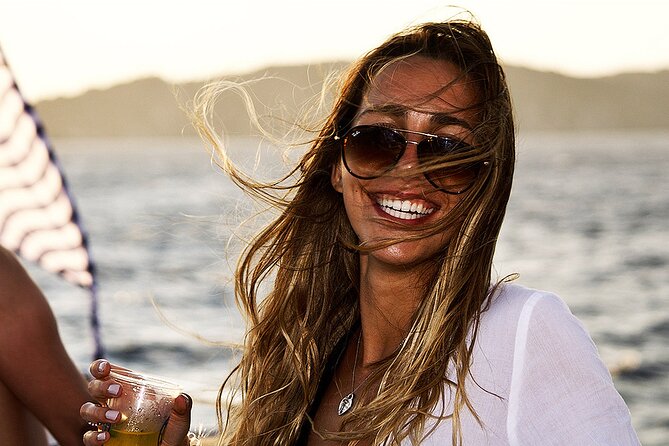 Boat Party with Swimming Stop Experience in Mykonos - Sunset Views and the Transition to Nightlife