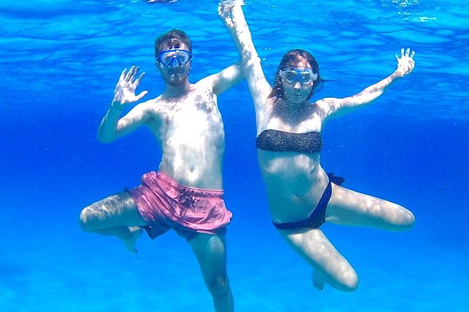 Boat Tour Egadi Day discover Favignana and Levanzo from Trapani - The Experience with the Guides and Crew