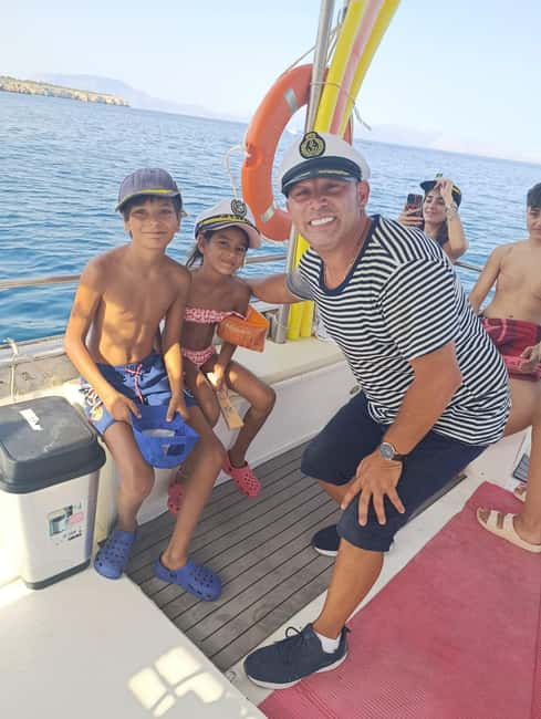 Boat tour from Terrasini: caves, snorkeling, and traditional tasting - Refreshing Stop at Cala Muletti