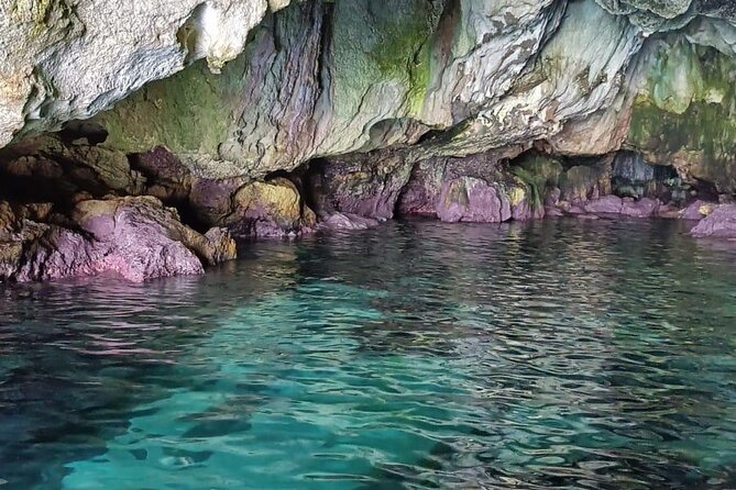 Boat tour Ortigia and Syracuse sea caves - The Short Swim Stop: Refreshing and Enjoyable