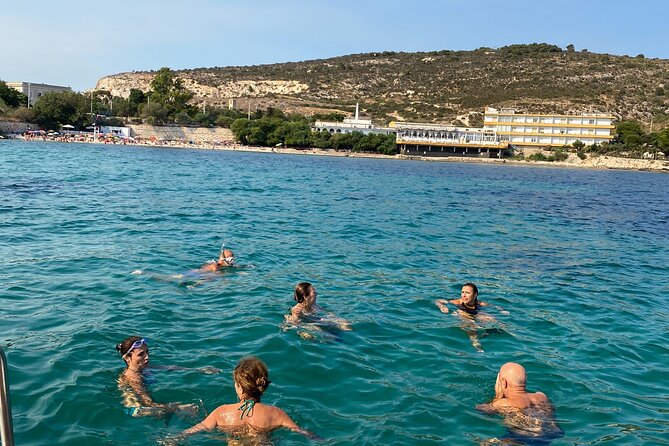 Boat Tour to Sella del Diavolo: Snorkeling, GoPro & Beer - Relaxing at Poetto Beach and Its Historic Roots