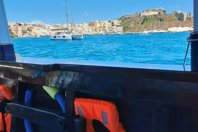 Boat tour with lunch on board to discover Procida - The Onboard Experience: Food, Drinks, and Atmosphere