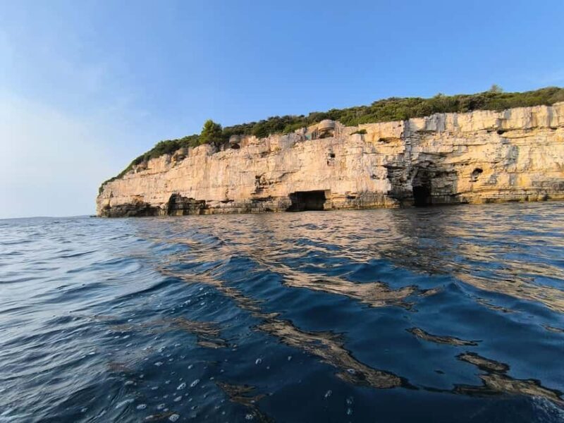 Boat Trip  Coastal Tour from Faana to Pula and snorkelling - Enjoy a Secret Stop for Swimming and Snorkeling