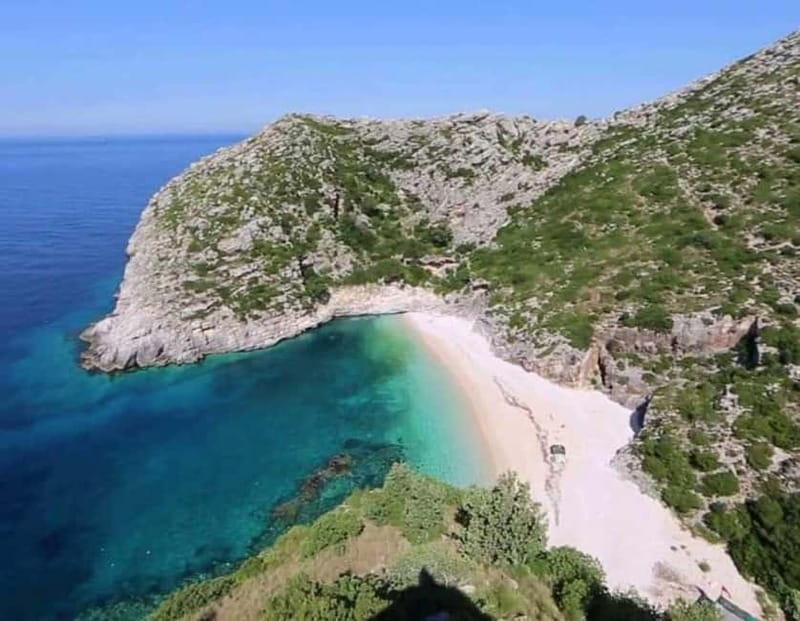 Boat Trip Vlore: Haxhi Ali Cave & Saint Jan Beach - Visiting Haxhi Ali Cave with a Guided Tour